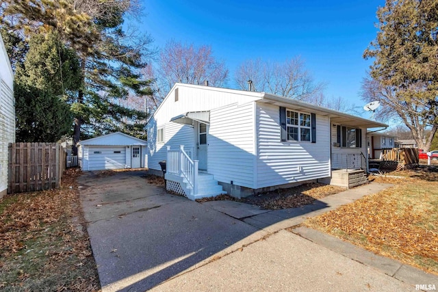 view of front of home with an outbuilding and a garage