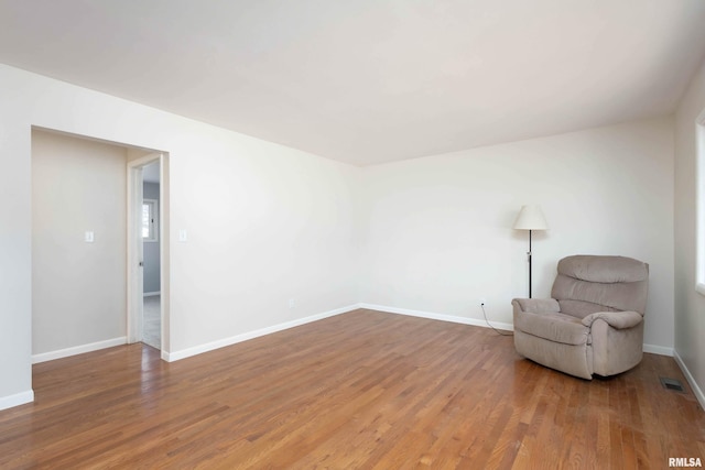 unfurnished room featuring wood-type flooring