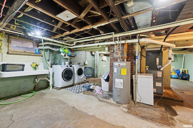 basement with water heater, fridge, and washer and dryer