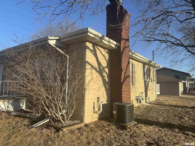 view of home's exterior featuring central AC