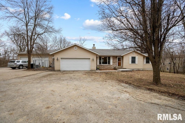 ranch-style house with a garage