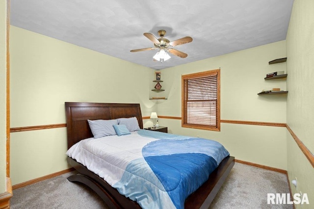 bedroom with light colored carpet and ceiling fan