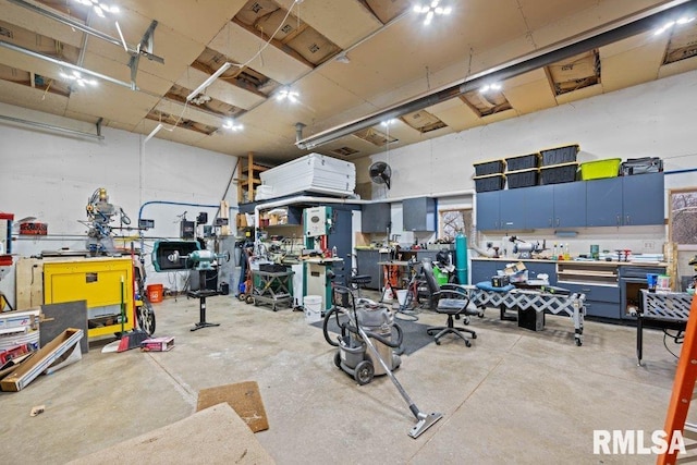 garage featuring a workshop area