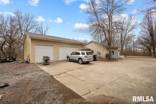 exterior space featuring a garage