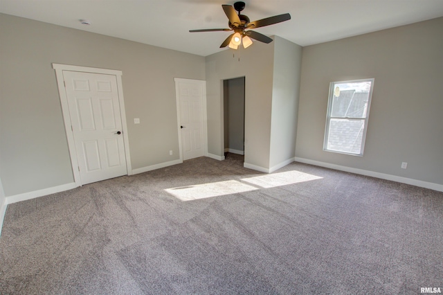 unfurnished bedroom with light carpet and ceiling fan