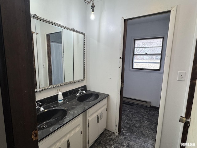 bathroom with vanity and a baseboard heating unit