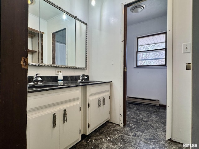 bathroom with a baseboard radiator and vanity