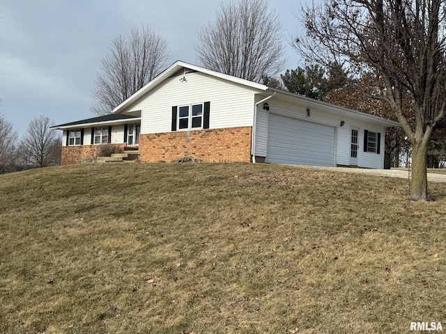 exterior space with a garage and a lawn