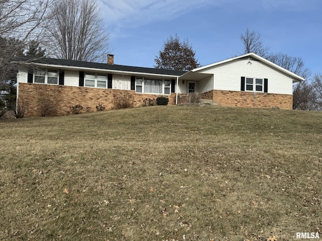 single story home with a front yard