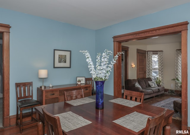 dining room with hardwood / wood-style flooring