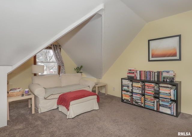 interior space featuring vaulted ceiling and carpet