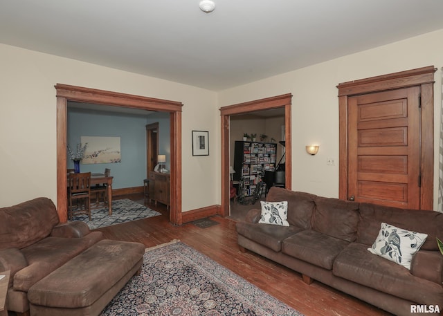 living room with wood-type flooring