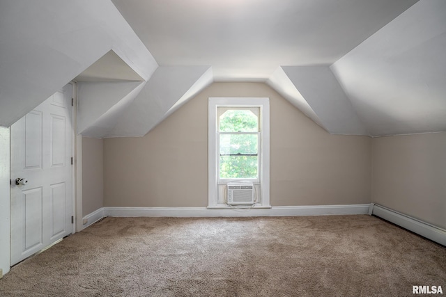 bonus room featuring carpet, cooling unit, lofted ceiling, and baseboard heating