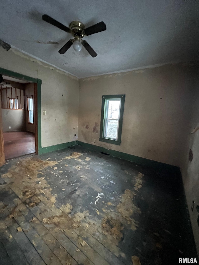 unfurnished room with crown molding