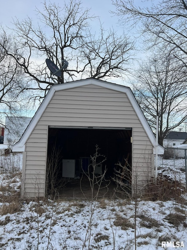 view of snow covered garage