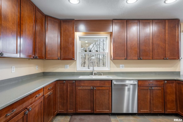 kitchen with sink and stainless steel dishwasher