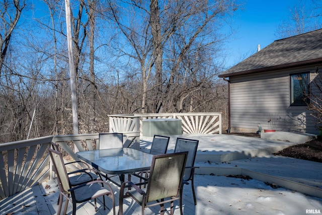 view of snow covered deck