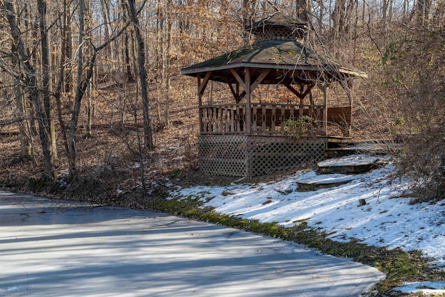 snow covered deck with a gazebo