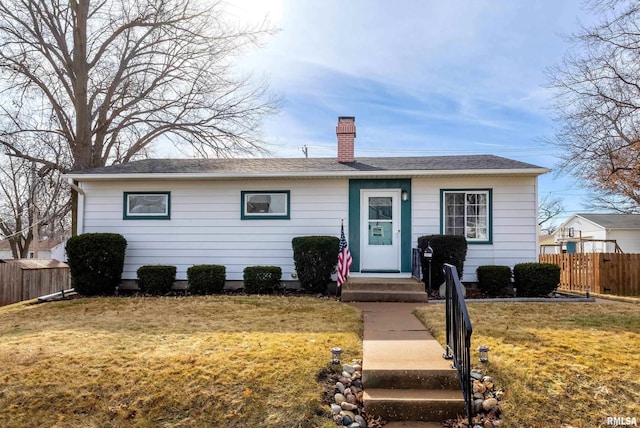 ranch-style house with a front yard