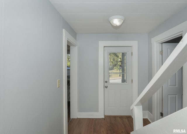 doorway with dark hardwood / wood-style flooring