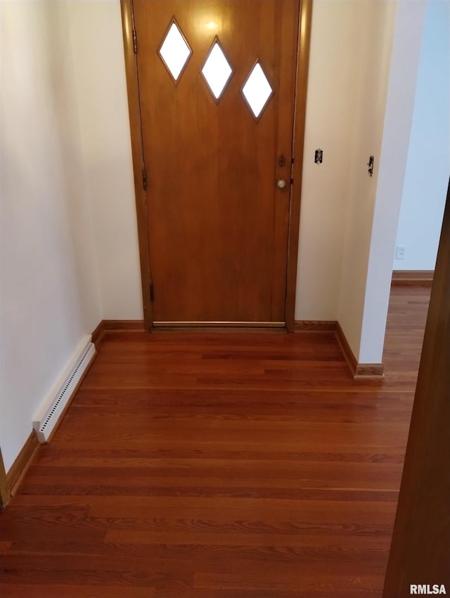 entryway with a baseboard radiator and dark hardwood / wood-style floors