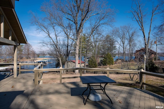 wooden deck with a water view