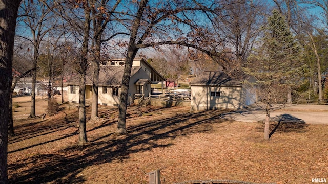 view of front of home with an outdoor structure