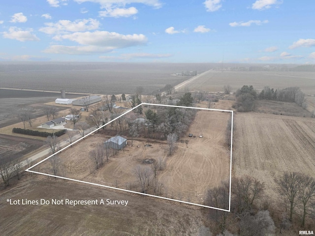 birds eye view of property featuring a rural view