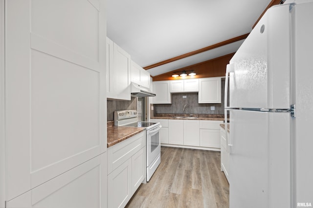 kitchen featuring white cabinetry, lofted ceiling, sink, light hardwood / wood-style floors, and white appliances