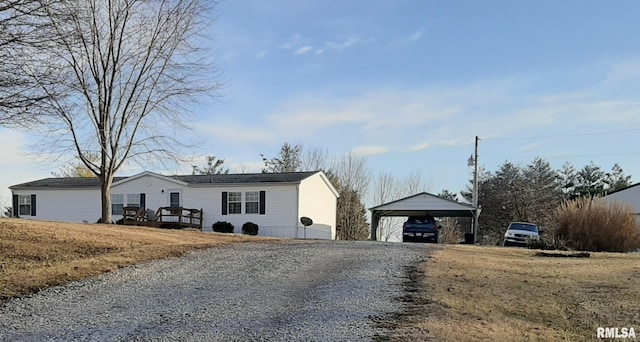 view of front of home with a carport