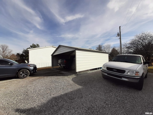 view of outbuilding featuring a carport