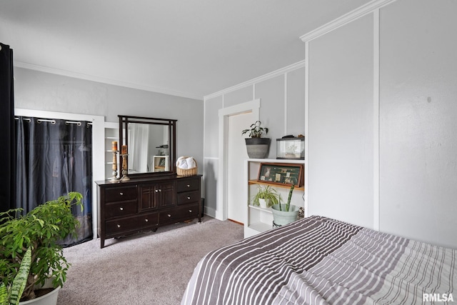 carpeted bedroom featuring crown molding