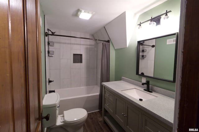 full bathroom featuring vanity, wood-type flooring, shower / bath combination with curtain, and toilet