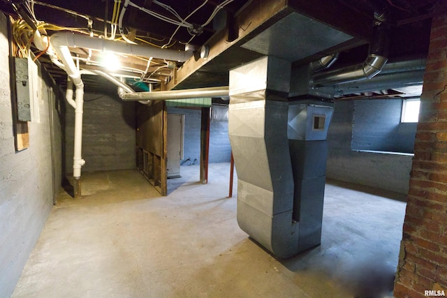 basement featuring heating unit