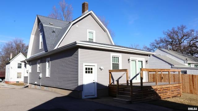 rear view of house with a deck