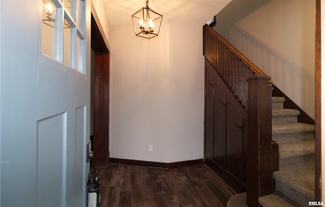 interior space with hardwood / wood-style floors and a notable chandelier