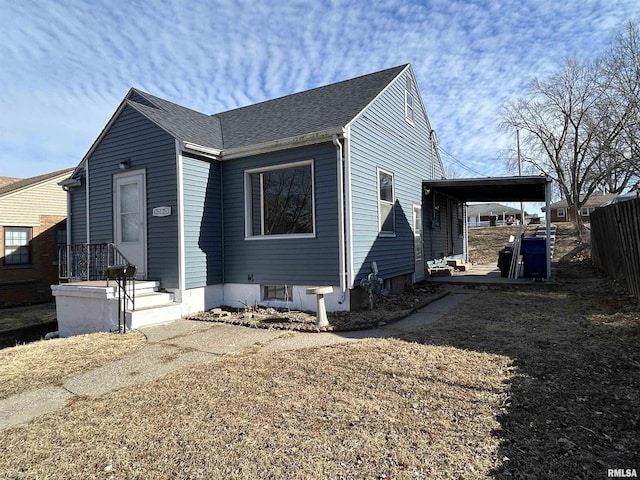 view of front of house with a carport