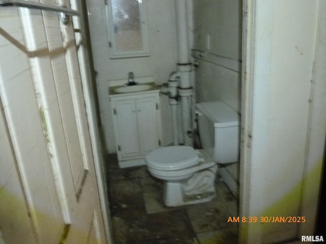 bathroom with toilet and sink