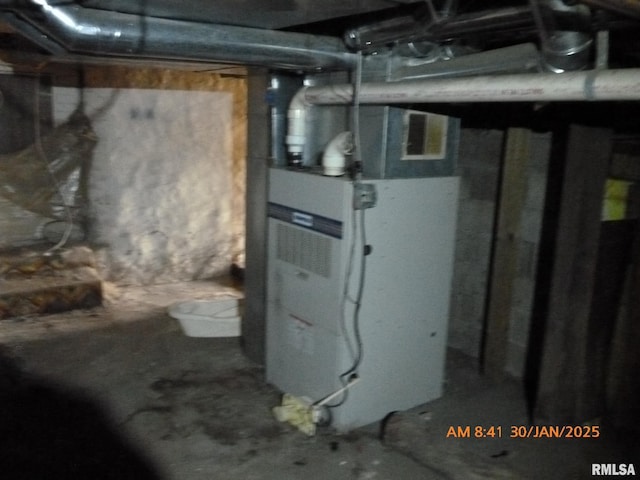 utility room with heating unit