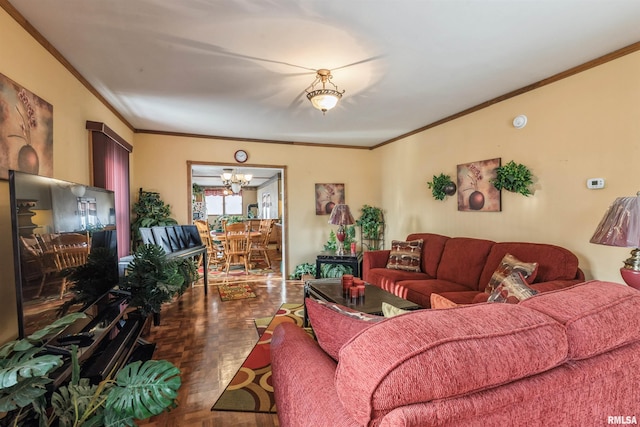 living room with parquet floors, ornamental molding, and an inviting chandelier