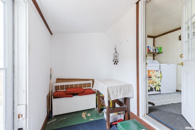 bedroom with washer and dryer