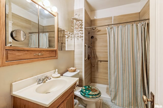 bathroom featuring a shower with curtain, vanity, and toilet