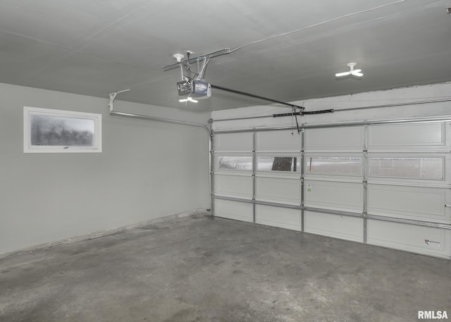 garage featuring a garage door opener