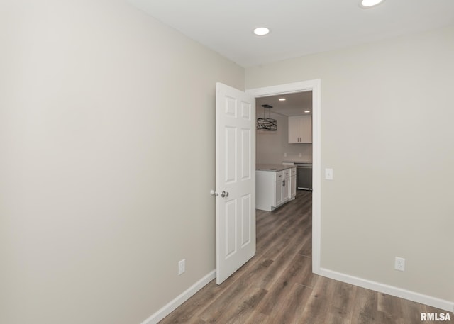 hallway featuring hardwood / wood-style flooring