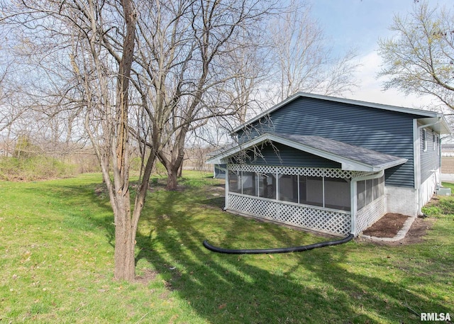 view of yard featuring a sunroom