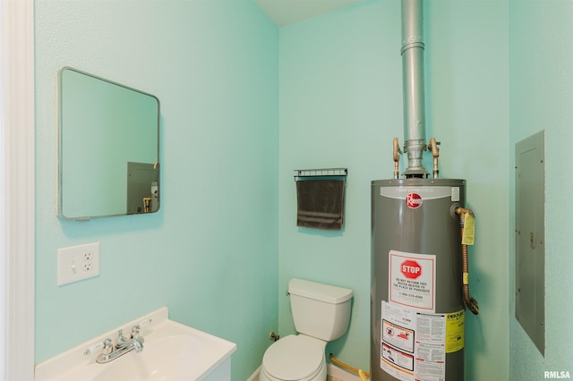 bathroom featuring water heater, sink, electric panel, and toilet