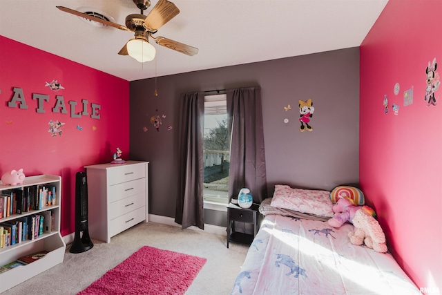 carpeted bedroom featuring ceiling fan