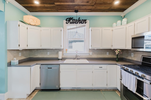 kitchen with appliances with stainless steel finishes, white cabinetry, sink, hanging light fixtures, and wooden ceiling