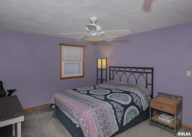 bedroom with light carpet and ceiling fan