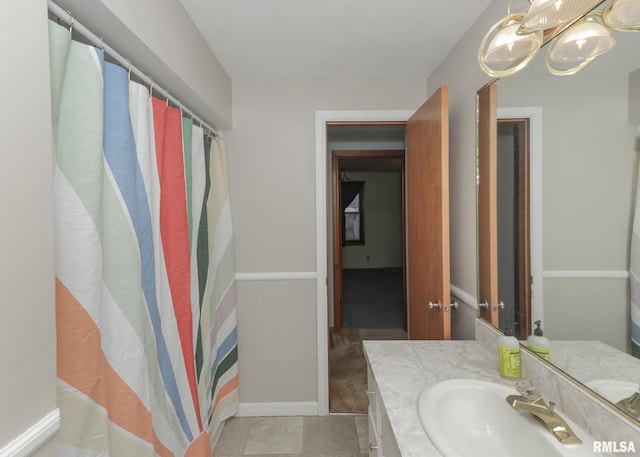 bathroom with vanity and a shower with curtain